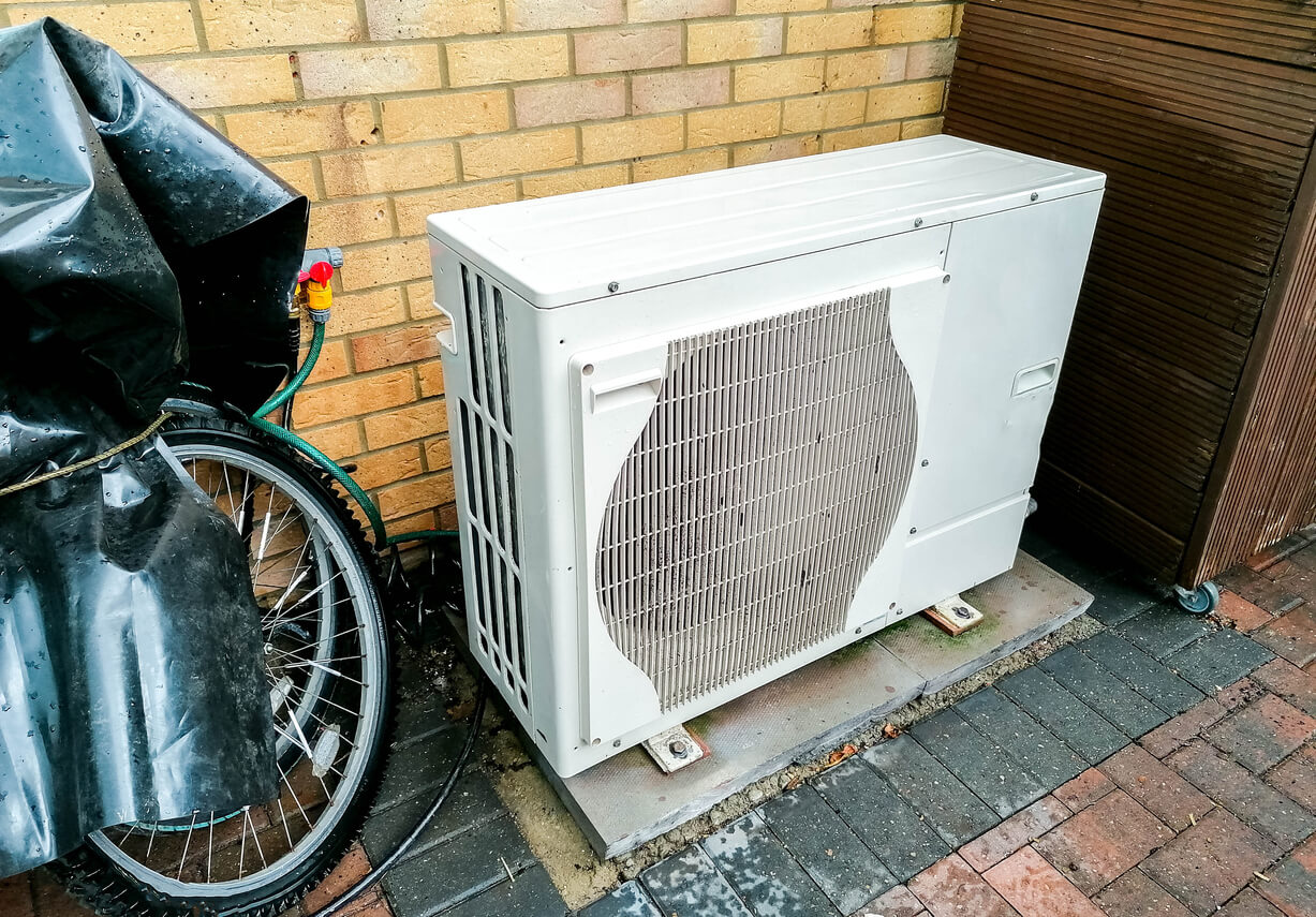 heat pump fitted outside a house