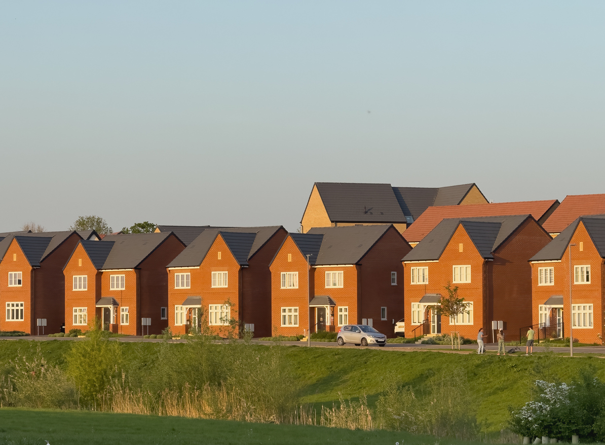 Row of Brick new build Homes in a Suburban Setting